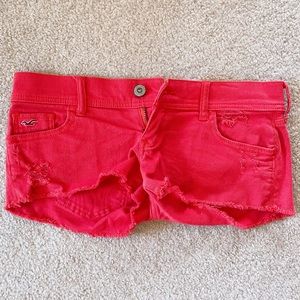 coral/red hollister distressed shorts